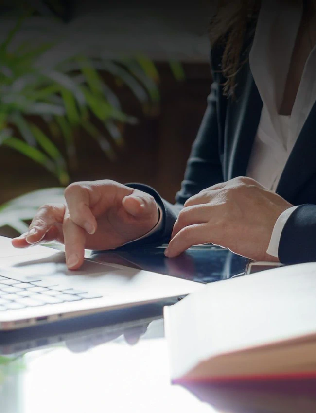 close up shot of lawyer using laptop